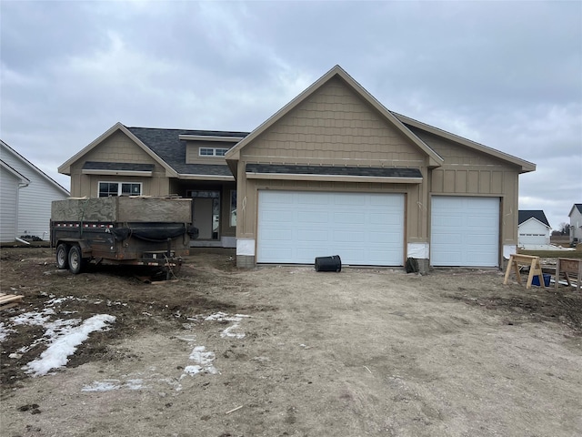 view of front of property featuring a garage