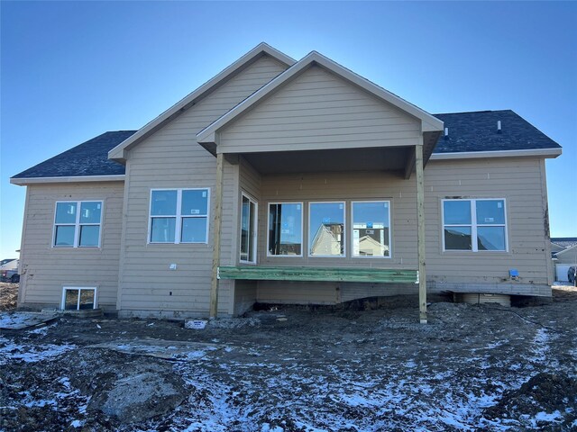 view of snow covered property