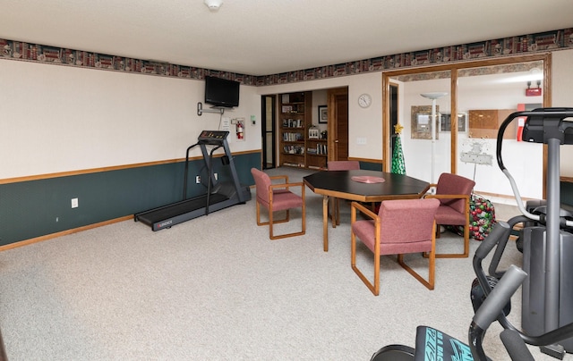 dining room featuring carpet flooring