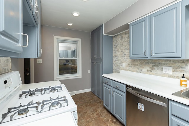 kitchen with dark tile patterned flooring, dishwasher, white gas range, and tasteful backsplash