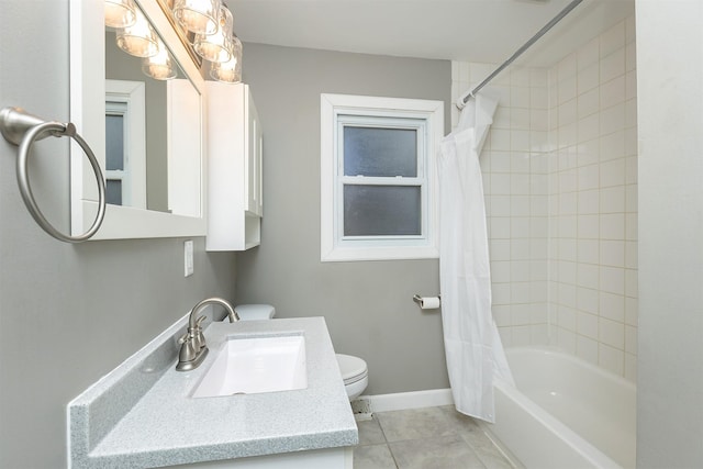 full bathroom featuring tile patterned floors, vanity, shower / tub combo, and toilet