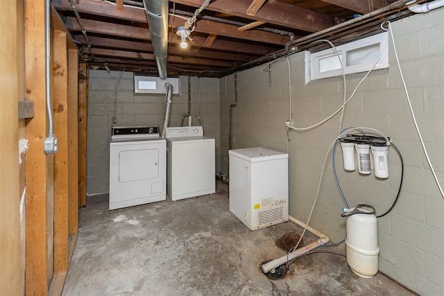 laundry room with independent washer and dryer and a wealth of natural light