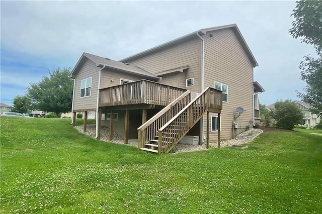 rear view of property with a lawn and a deck