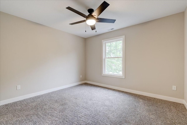 carpeted empty room with ceiling fan