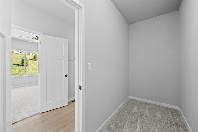 interior space featuring ceiling fan