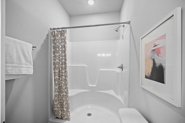 bathroom with walk in shower