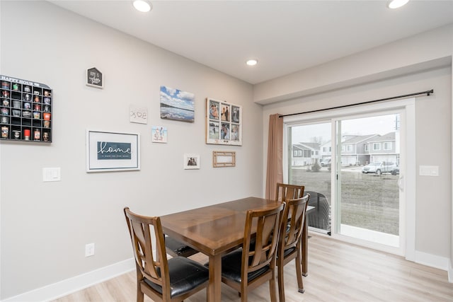 dining room featuring light hardwood / wood-style flooring