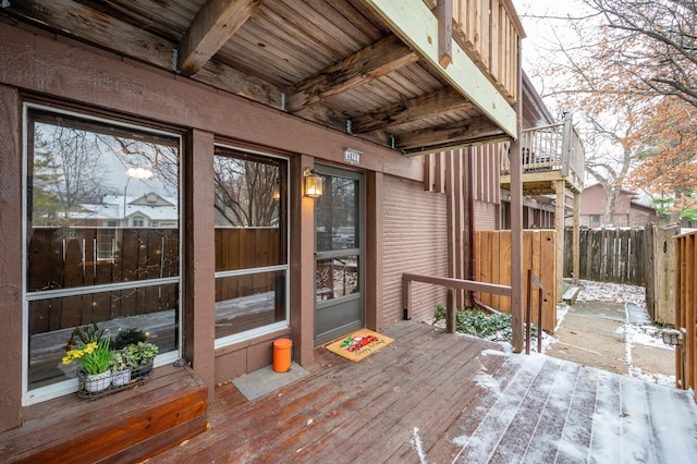 view of snow covered deck