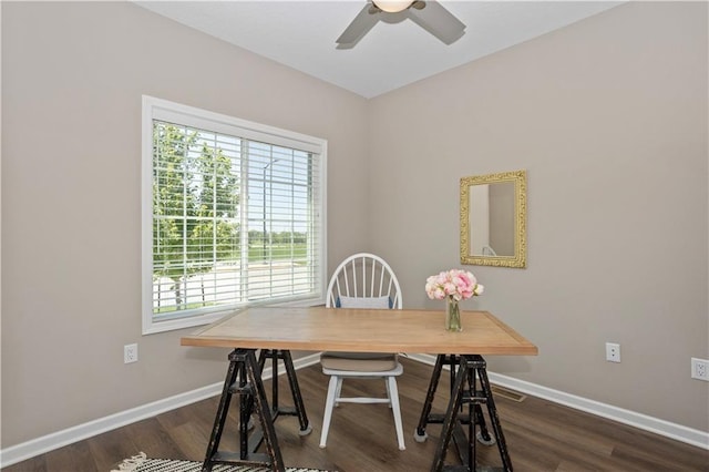 office area with ceiling fan and dark wood-type flooring