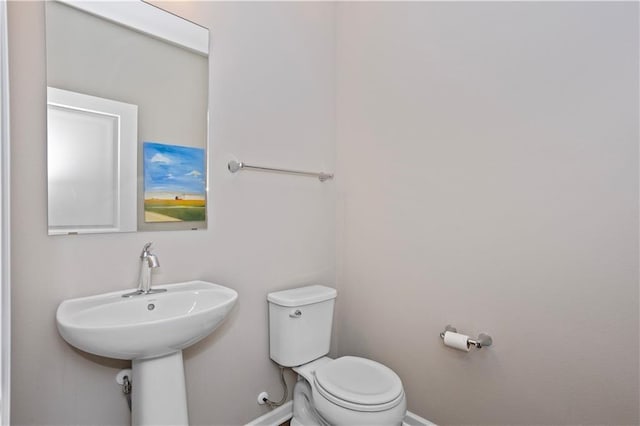 bathroom featuring toilet