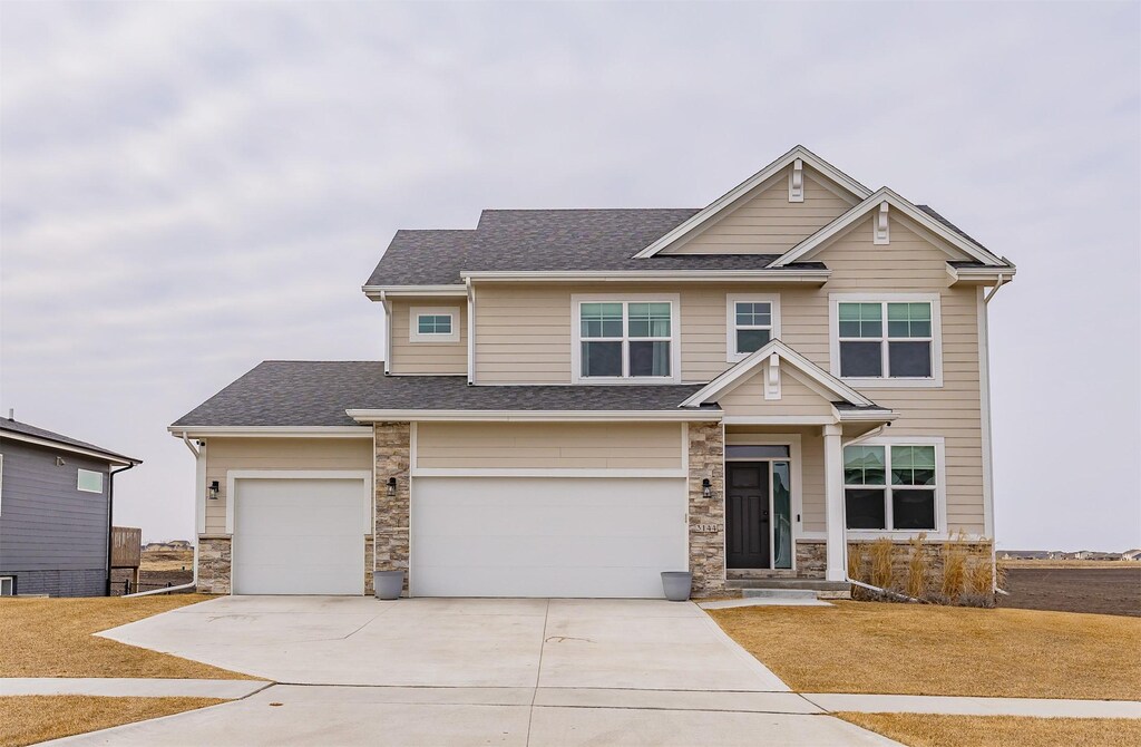 craftsman-style house with a garage