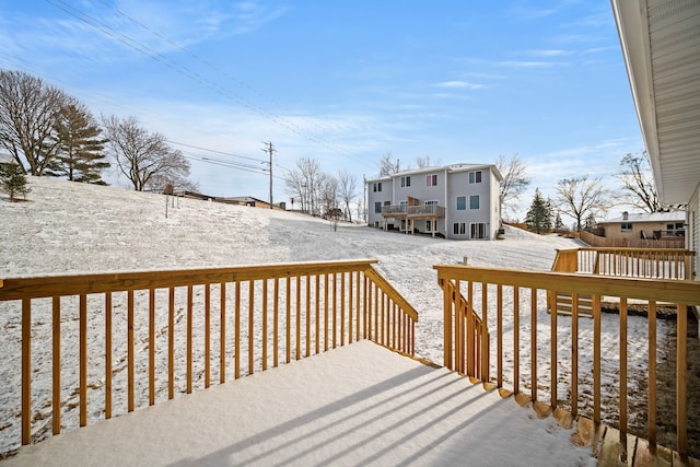 view of snow covered deck