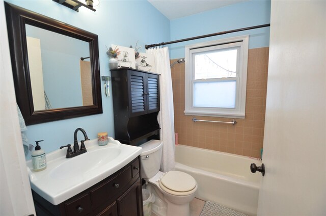 full bathroom featuring vanity, toilet, and shower / bath combo with shower curtain