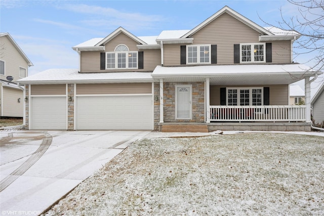 front facade featuring a porch and a garage