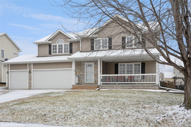 view of front facade with a porch and a garage