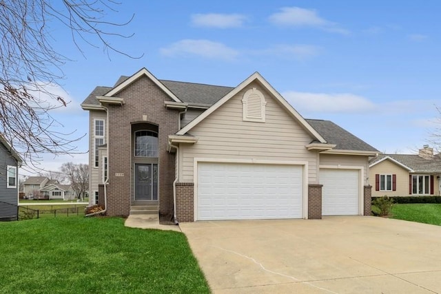 view of front facade featuring a garage and a front lawn