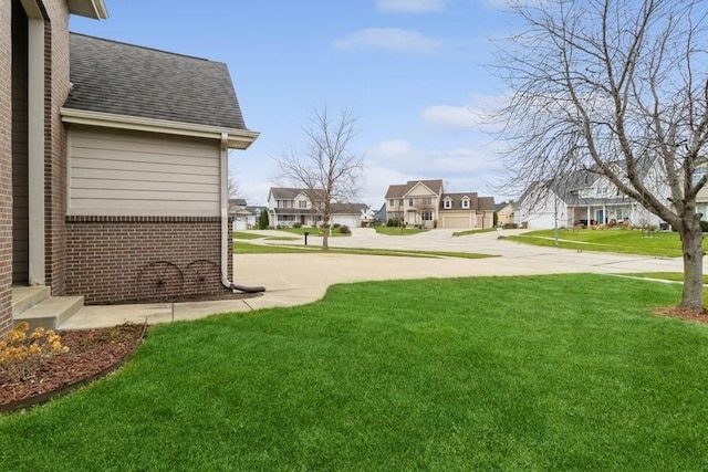 view of yard featuring a garage