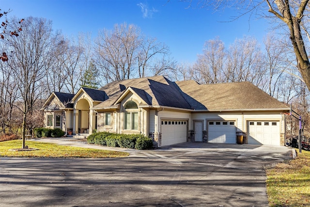 view of front of home with a garage