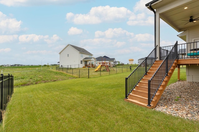 view of yard featuring ceiling fan