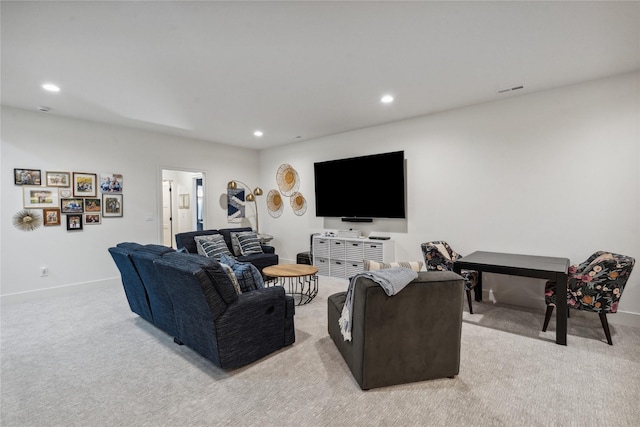 living room featuring light carpet