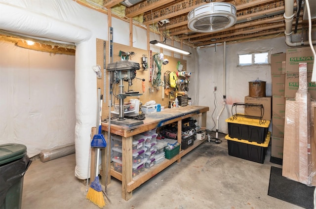 basement with a workshop area