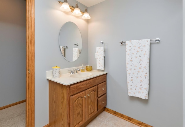 bathroom with tile patterned flooring and vanity