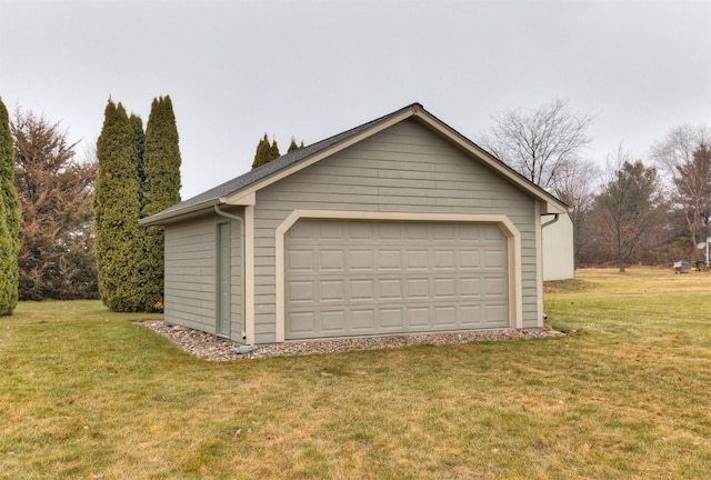 garage with a yard