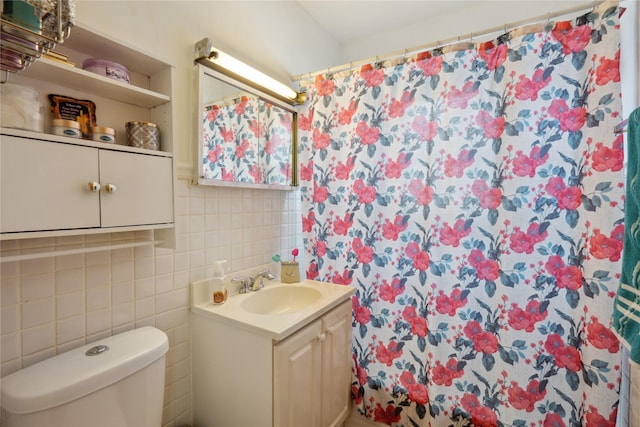 bathroom featuring vanity, backsplash, a shower with shower curtain, toilet, and tile walls