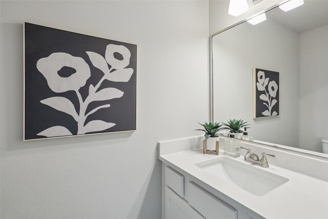3251 NW Brookside Dr, Grimes, IA 50111 - bathroom with vanity and toilet
