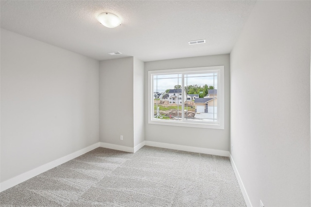 3251 NW Brookside Dr, Grimes, IA 50111 - carpeted spare room with baseboards