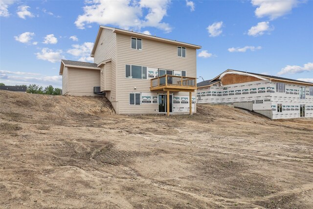 3251 NW Brookside Dr, Grimes, IA 50111 - back of property with a deck and cooling unit