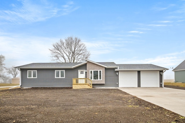 single story home with a garage