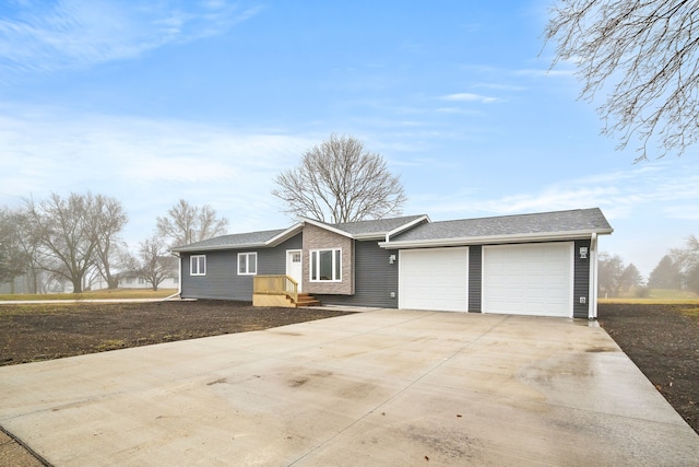 ranch-style home with a garage