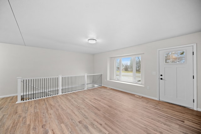 entrance foyer with light hardwood / wood-style floors