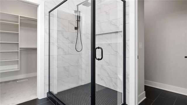 bathroom featuring tile patterned flooring and walk in shower