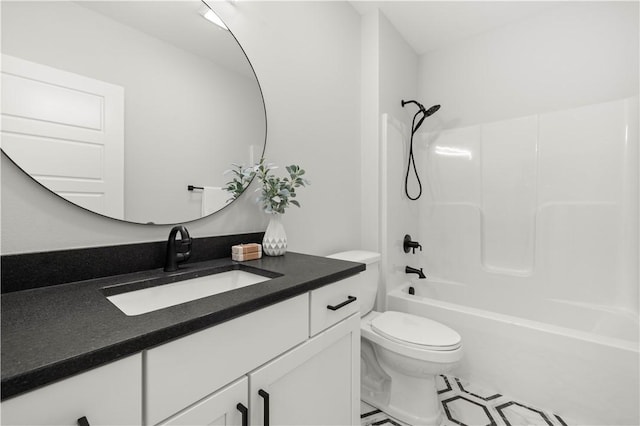 full bathroom with vanity, shower / bath combination, and toilet