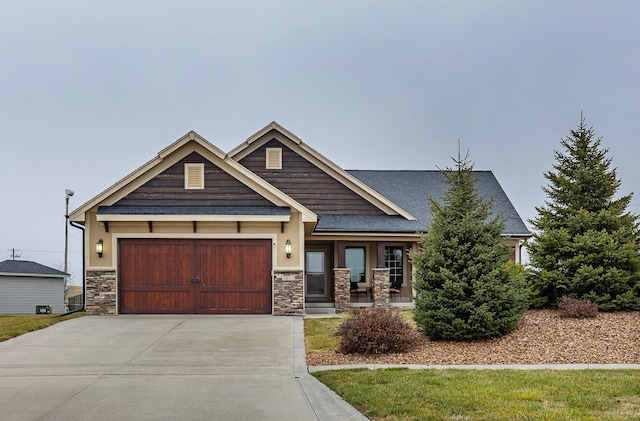 craftsman-style house featuring a garage