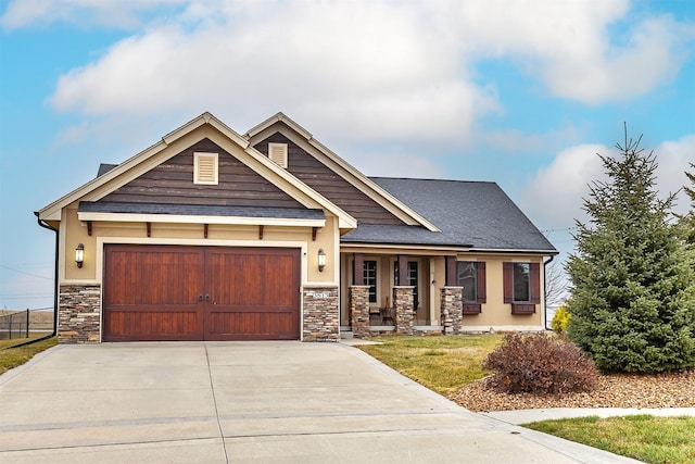 3513 Sunstone Ct SE, Altoona, IA 50009 - craftsman inspired home with covered porch, stone siding, concrete driveway, a garage, and roof with shingles
