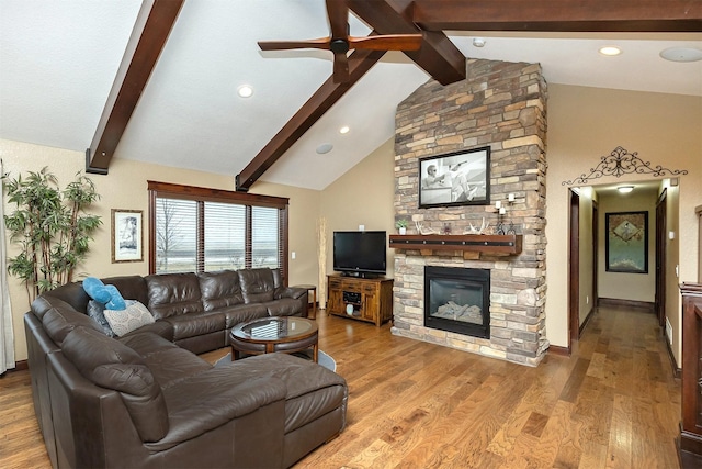 3513 Sunstone Ct SE, Altoona, IA 50009 - living area featuring a fireplace, wood finished floors, and a ceiling fan