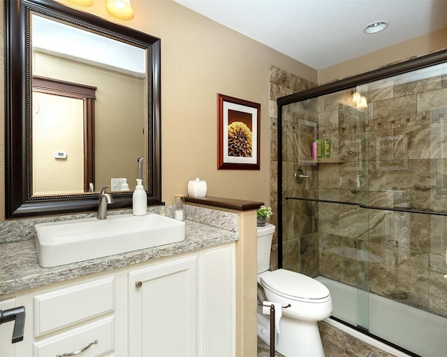 3513 Sunstone Ct SE, Altoona, IA 50009 - full bathroom featuring vanity and a stall shower