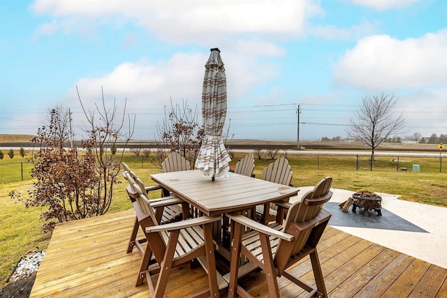 3513 Sunstone Ct SE, Altoona, IA 50009 - wooden terrace featuring a fire pit, outdoor dining area, and a view of rural / pastoral area
