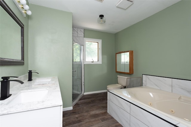 full bathroom with vanity, wood-type flooring, toilet, and separate shower and tub