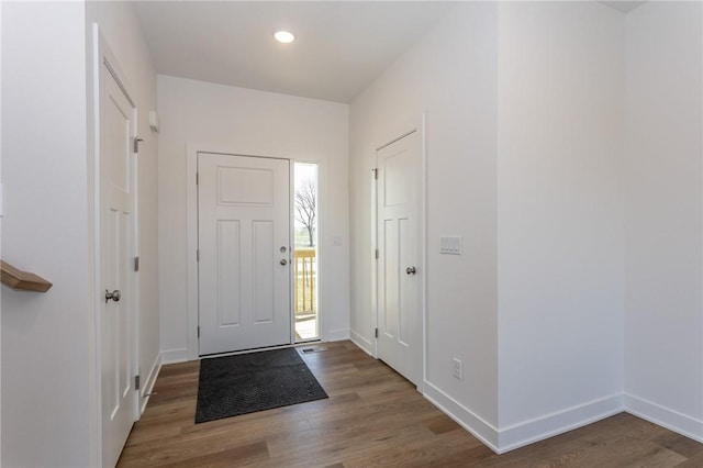 entrance foyer with hardwood / wood-style floors