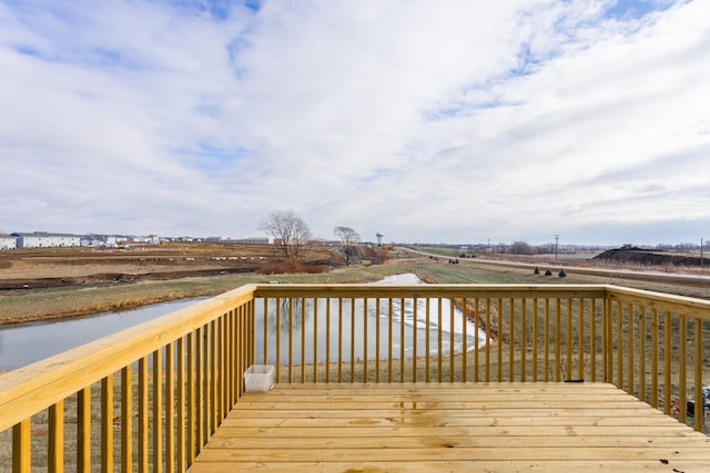 985 11th St, Waukee, IA 50263 - wooden deck featuring a water view
