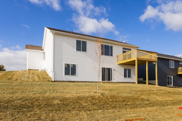 985 11th St, Waukee, IA 50263 - back of house with a wooden deck and a lawn