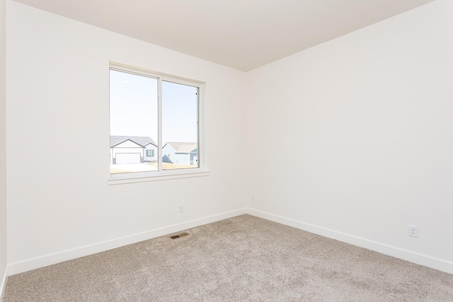 985 11th St, Waukee, IA 50263 - carpeted empty room with baseboards and visible vents