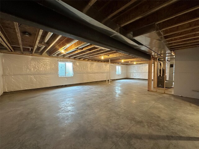 1060 Gray Ave, Waukee, IA 50263 - below grade area featuring heating unit