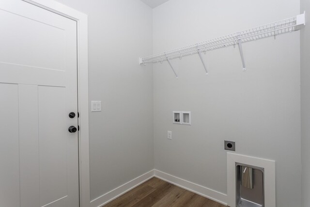 1060 Gray Ave, Waukee, IA 50263 - laundry area with hookup for a washing machine, baseboards, dark wood finished floors, electric dryer hookup, and laundry area