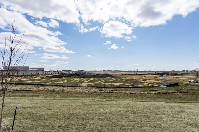 1060 Gray Ave, Waukee, IA 50263 - view of yard featuring fence and a rural view