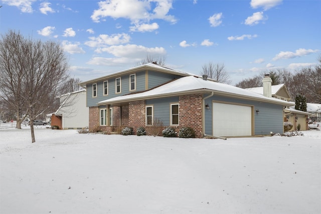 front of property with a garage